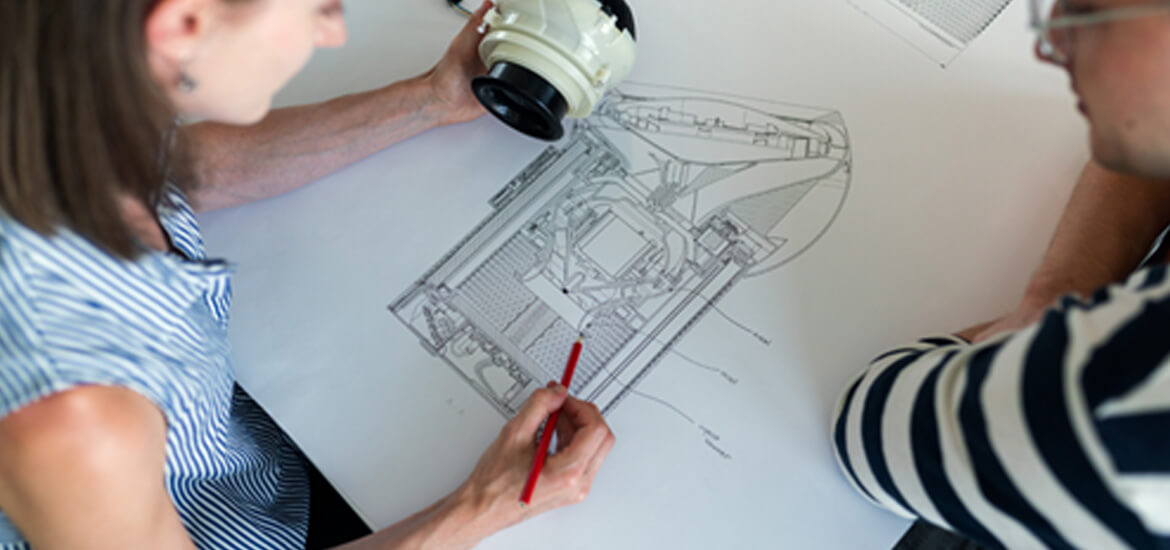 Product and engineering team reviewing a technical system design